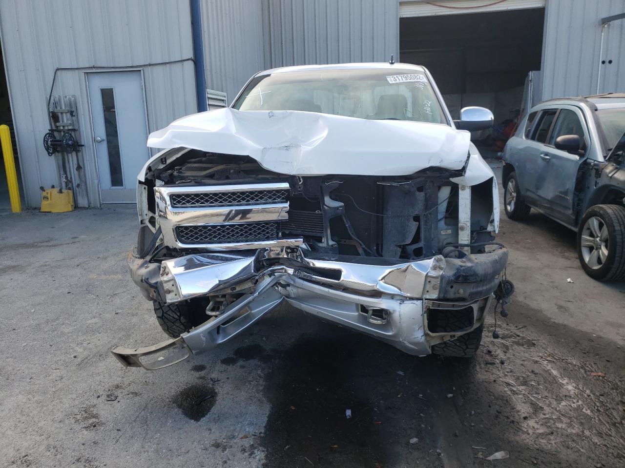 Photo 9 from auction – 2013 CHEVROLET SILVERADO with VIN 1GCRKSE70DZ403643