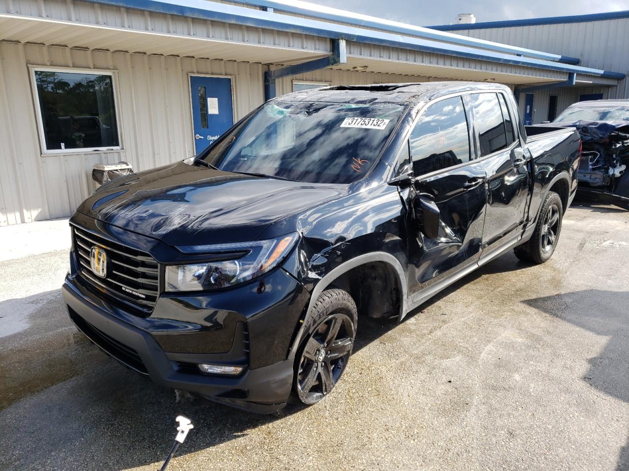 Photo 2 from auction – 2021 HONDA RIDGELINE with VIN 5FPYK3F8XMB008312