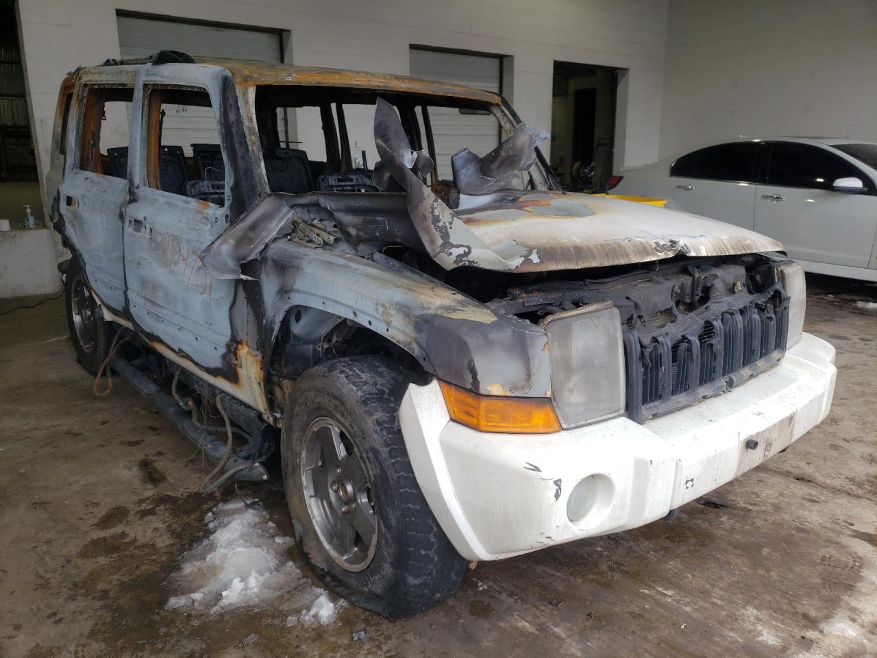 JEEP COMMANDER 2006 with VIN 1J8HG48K36C104400 - Photo from auction