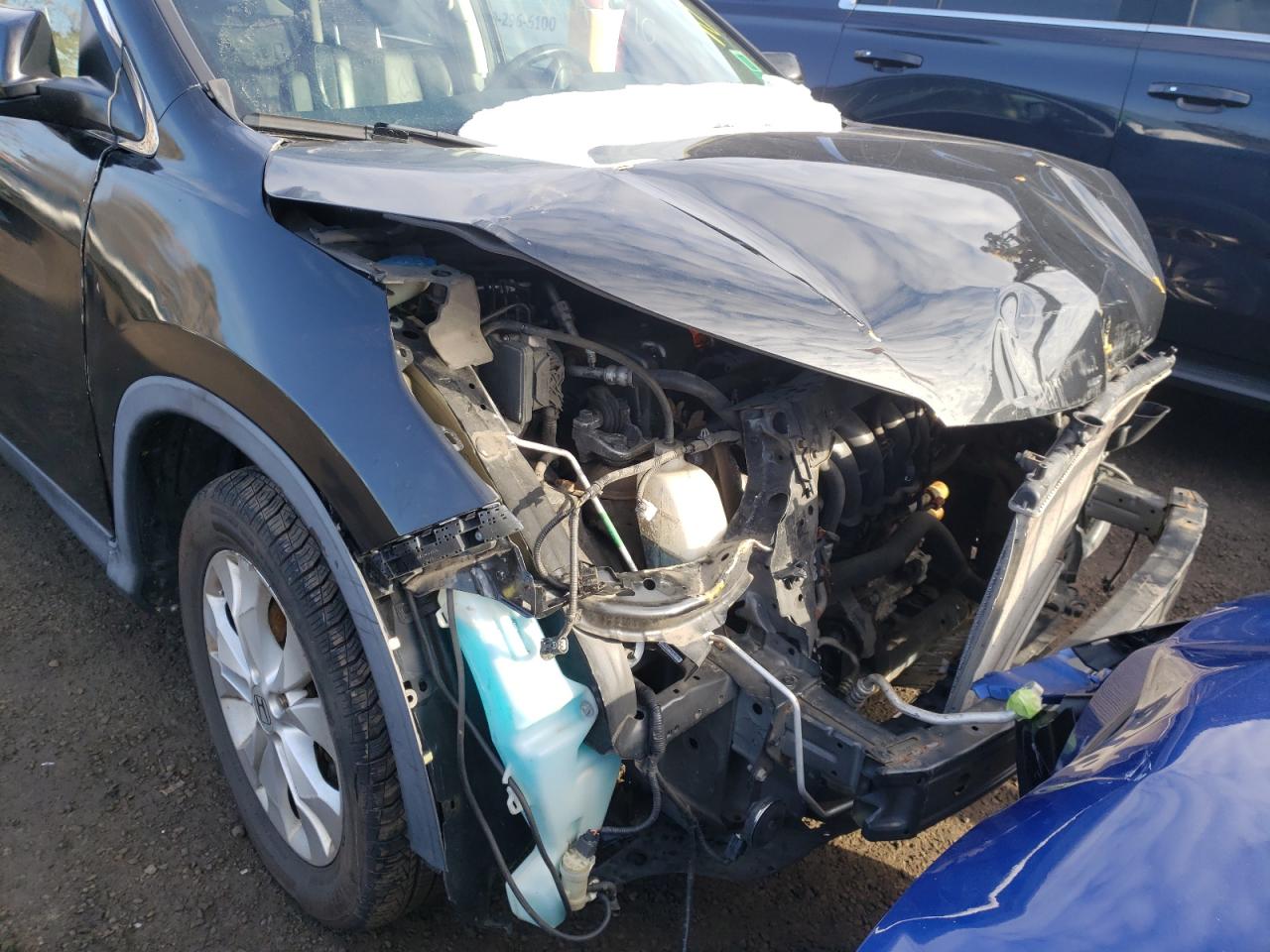 Photo 9 from auction – 2012 HONDA CR-V EXL with VIN JHLRM4H76CC020893