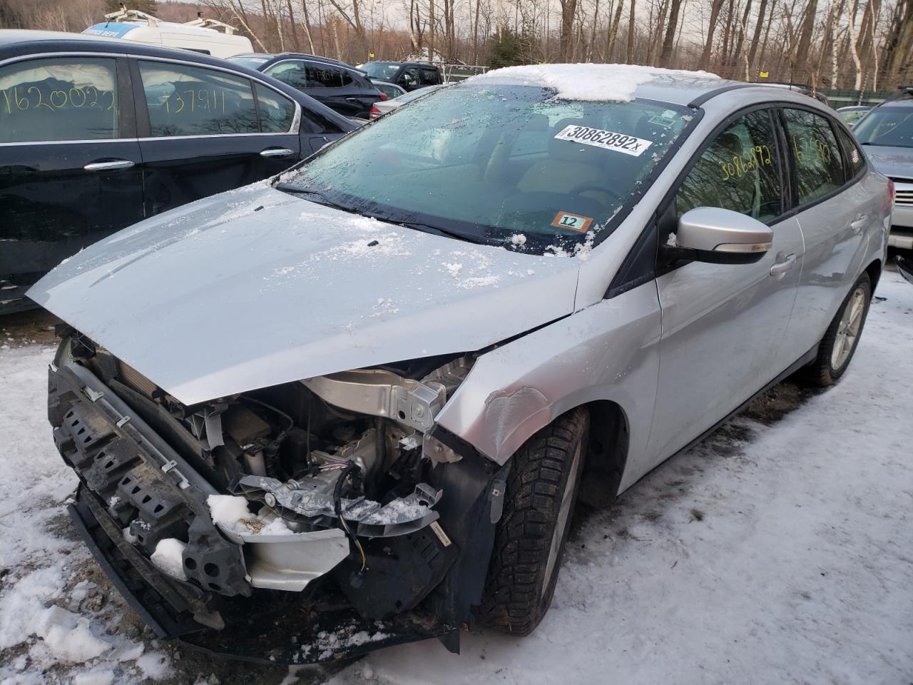 Photo 2 from auction – 2016 FORD FOCUS SE with VIN 1FADP3F24GL384807