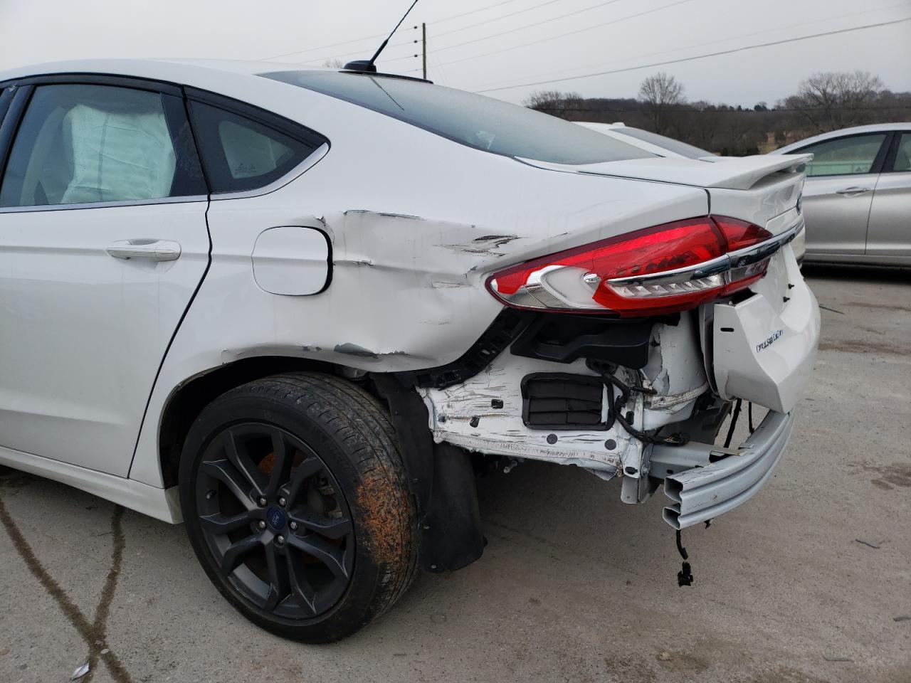 Photo 10 from auction – 2018 FORD FUSION SE with VIN 3FA6P0HD9JR216742