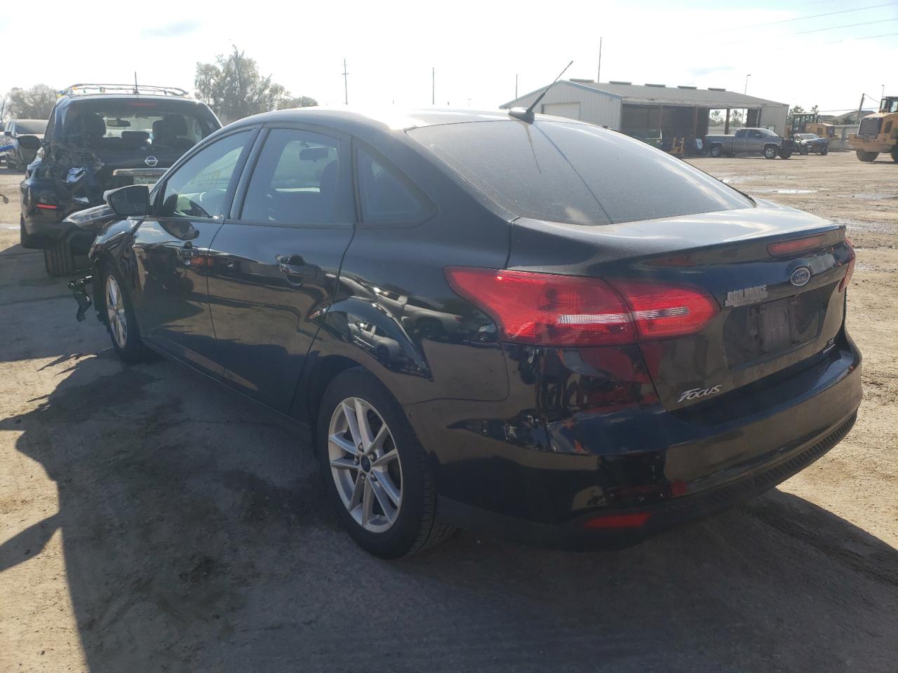 Photo 3 from auction – 2016 FORD FOCUS SE with VIN 1FADP3F26GL267777