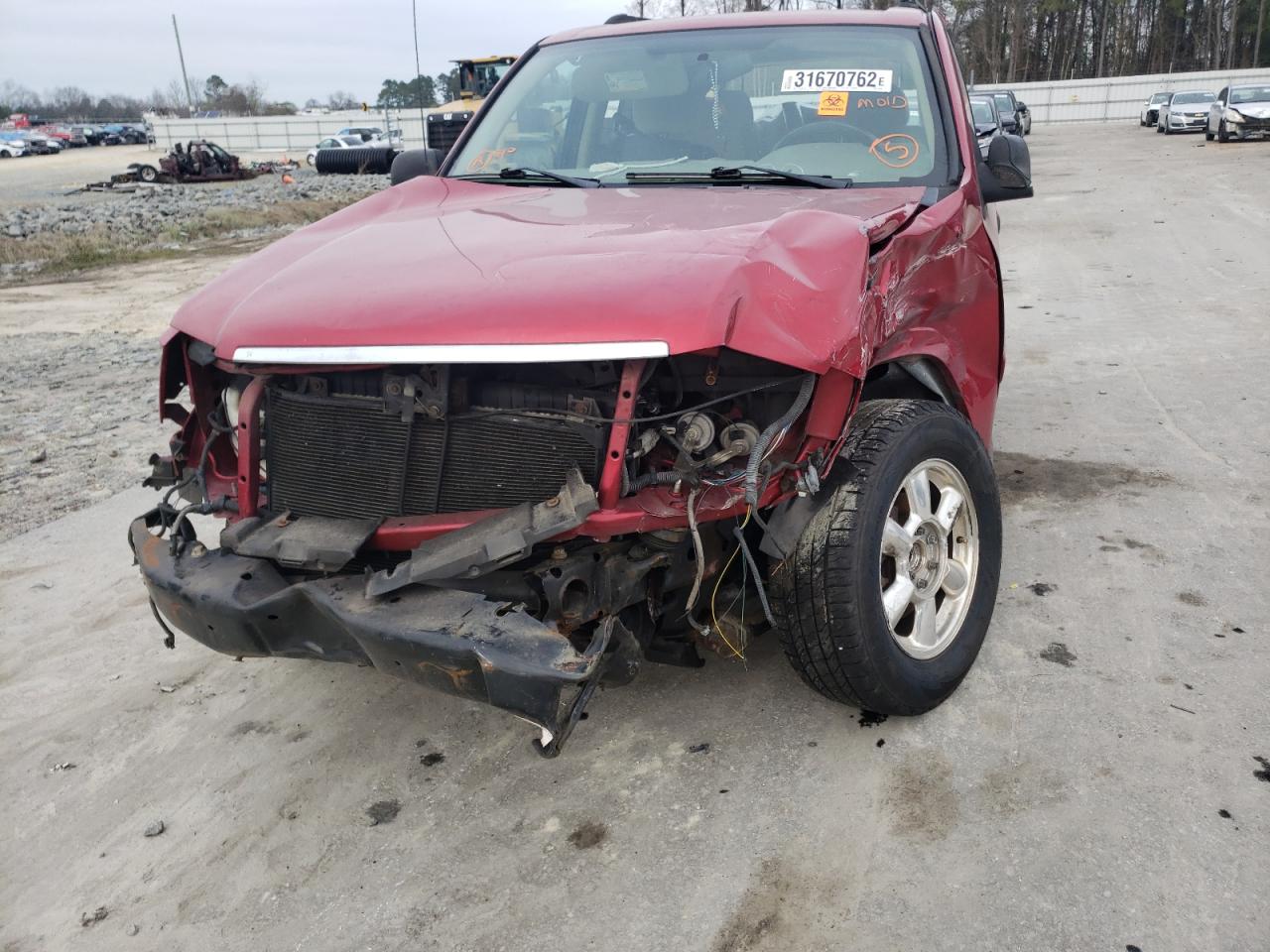 Photo 9 from auction – 2004 GMC ENVOY with VIN 1GKDS13S642221289