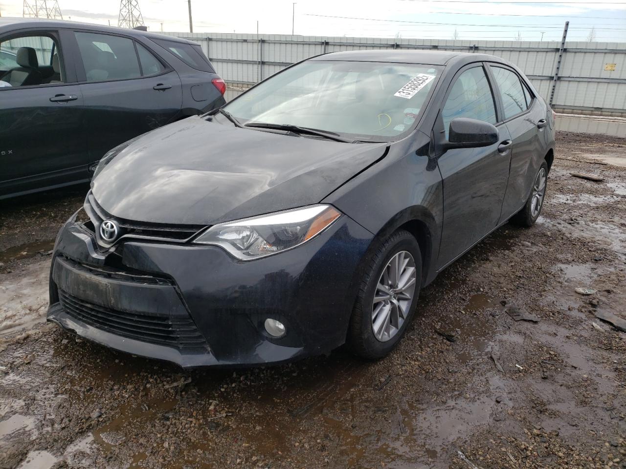 Photo 2 from auction – 2014 TOYOTA COROLLA L with VIN 2T1BURHE7EC148452