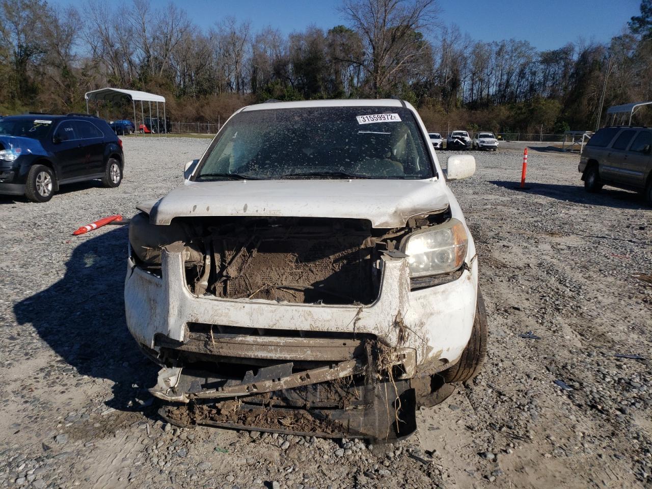 Photo 9 from auction – 2006 HONDA PILOT EX with VIN 5FNYF28516B048968