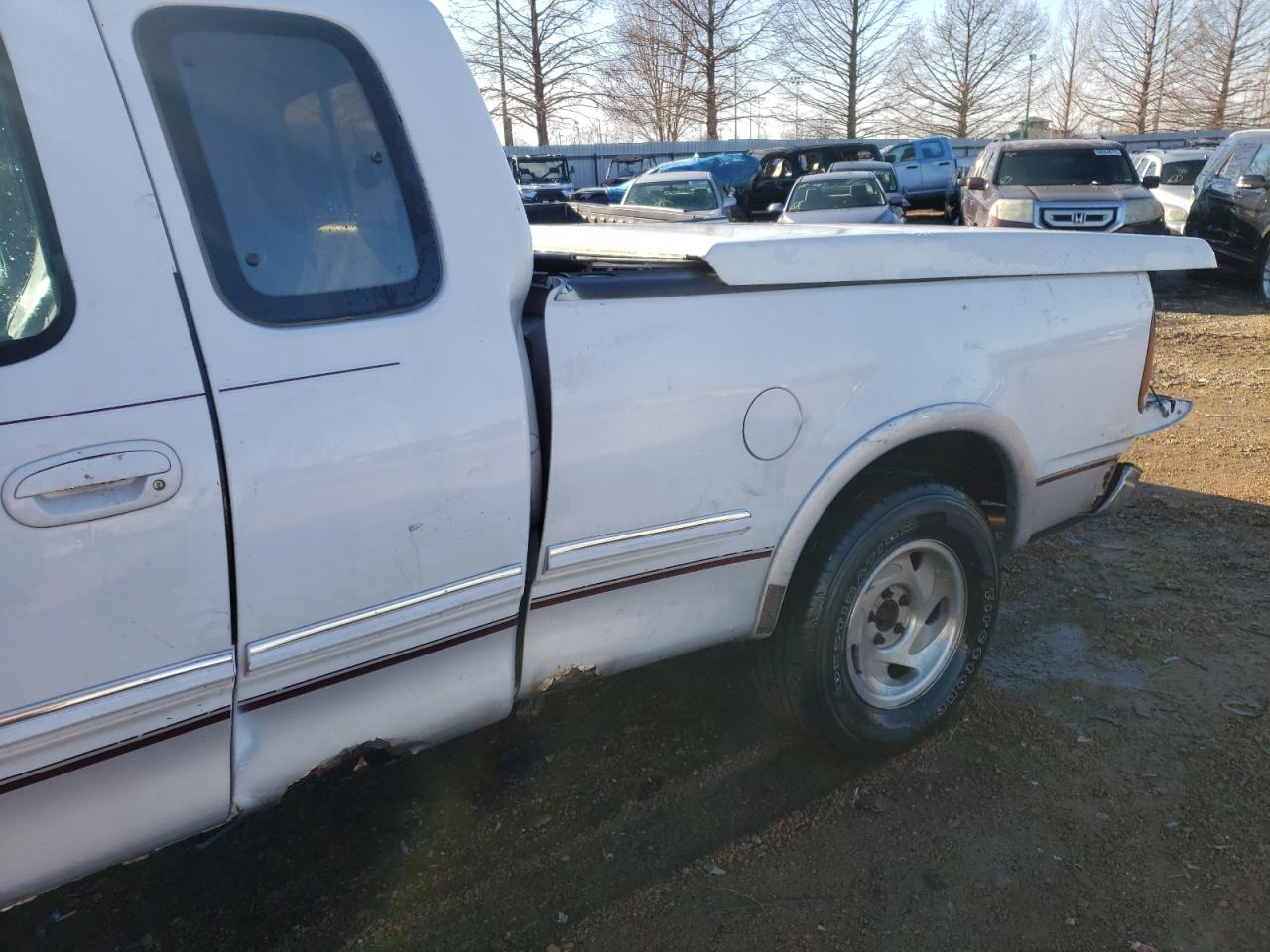 Photo 9 from auction – 1997 FORD F-150 with VIN 1FTDX1867VNA19974