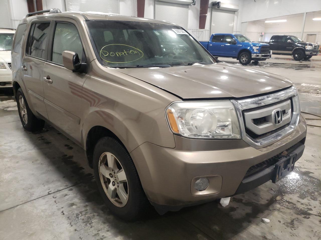 HONDA PILOT 2009 with VIN 5FNYF48419B012530 - Photo from auction