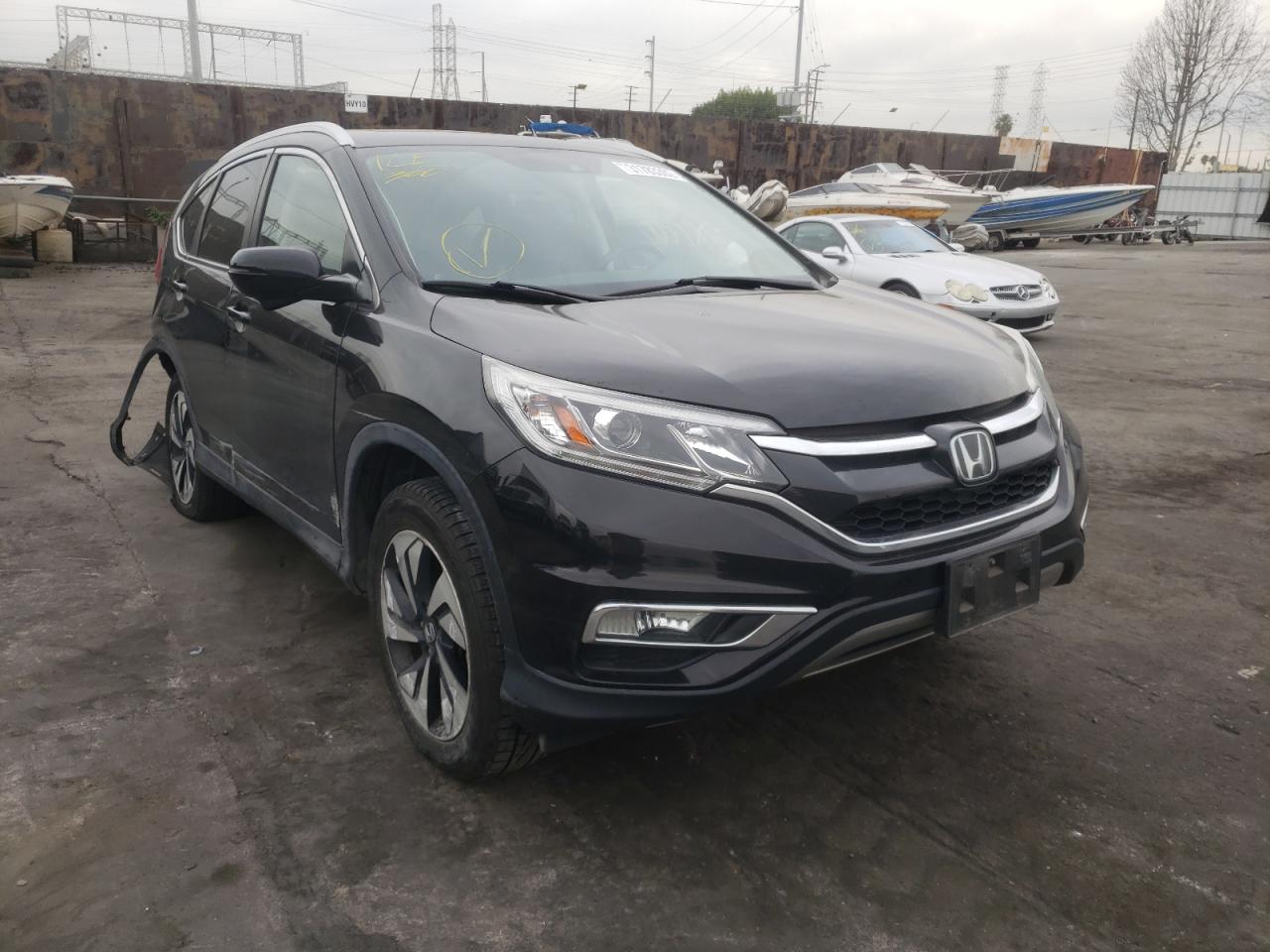 HONDA CR-V TOURI 2015 with VIN 5J6RM3H93FL021121 - Photo from auction