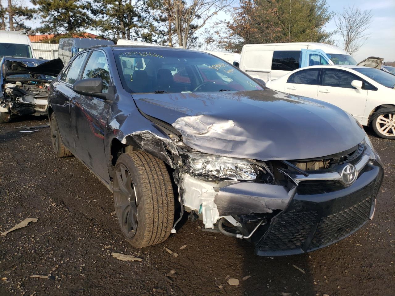TOYOTA CAMRY LE 2017 with VIN 4T1BF1FKXHU645759 - Photo from auction