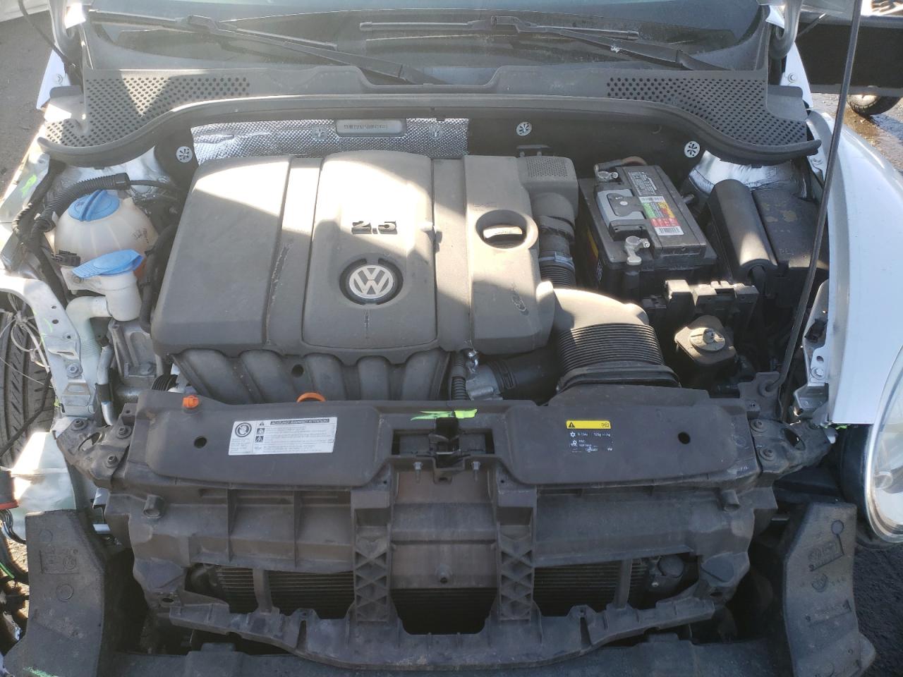 Photo 7 from auction – 2013 VOLKSWAGEN BEETLE with VIN 3VWFP7AT5DM662681