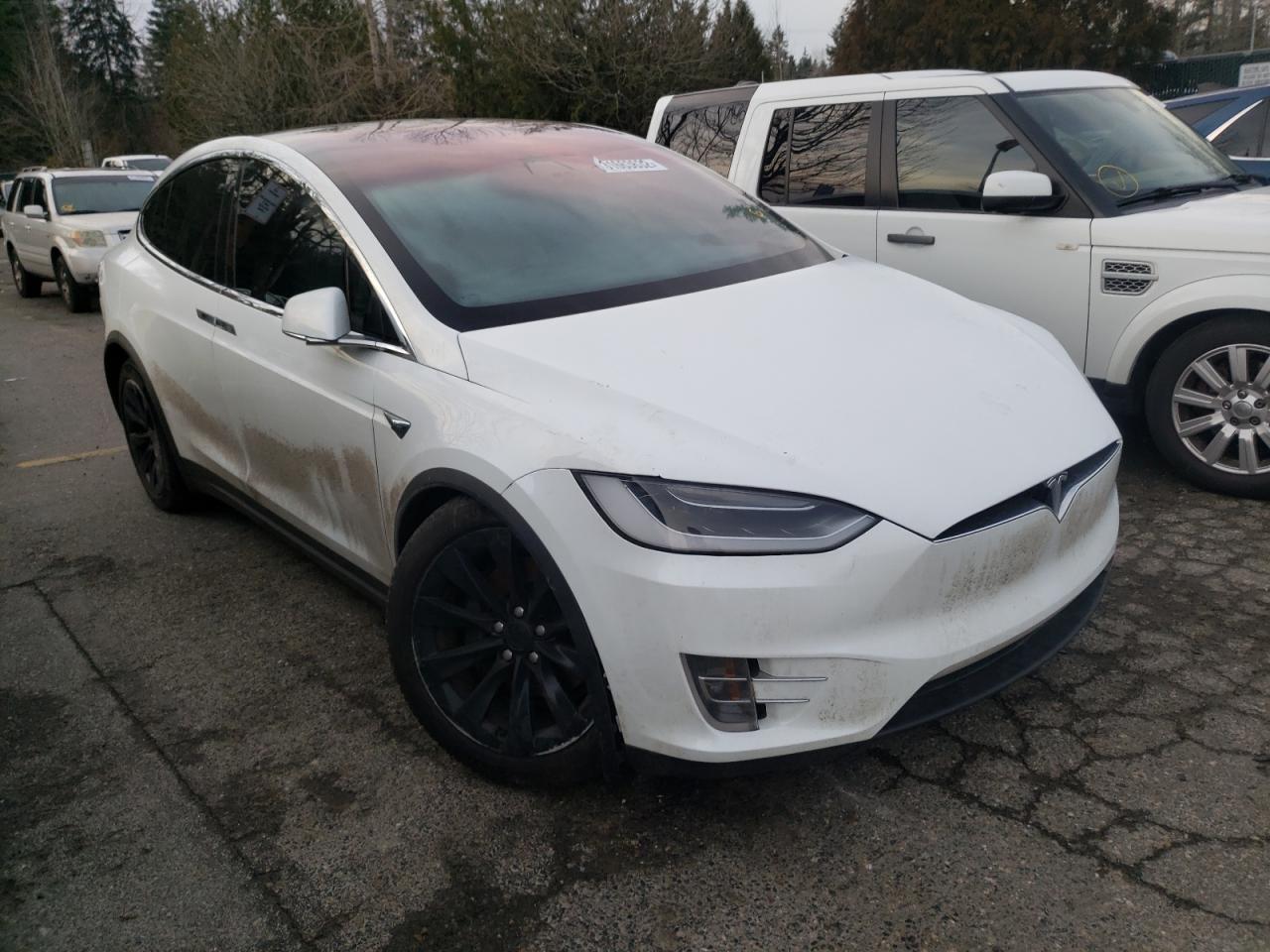 TESLA MODEL X 2018 with VIN 5YJXCDE28JF078018 - Photo from auction