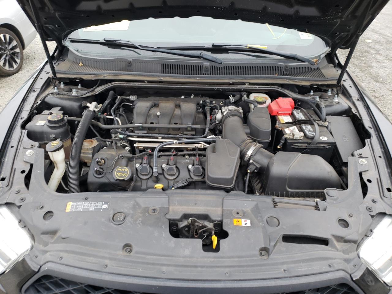 Photo 7 from auction – 2015 FORD TAURUS POL with VIN 1FAHP2MK4FG159793