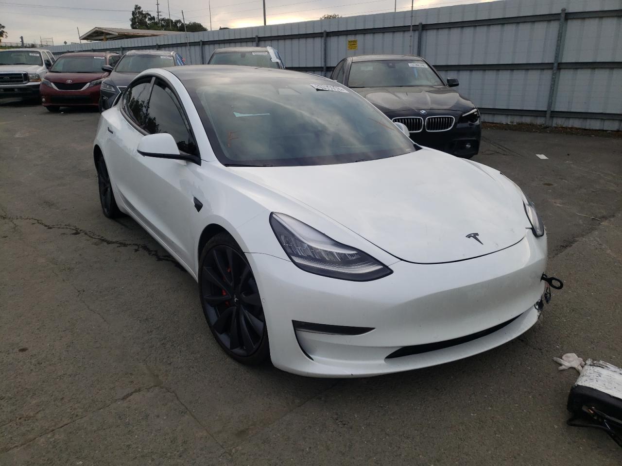 TESLA MODEL 3 2020 with VIN 5YJ3E1EC7LF715032 - Photo from auction