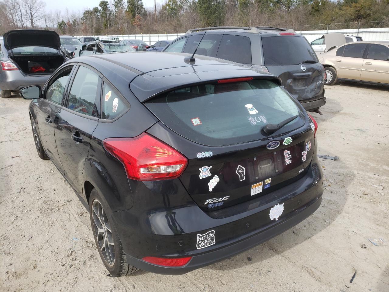 Photo 3 from auction – 2018 FORD FOCUS SEL with VIN 1FADP3M2XJL319907