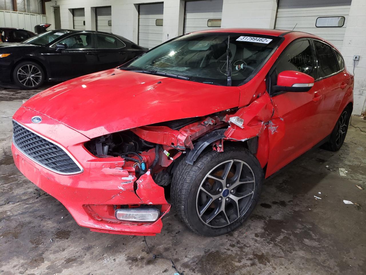 Photo 2 from auction – 2017 FORD FOCUS SEL with VIN 1FADP3M23HL249659