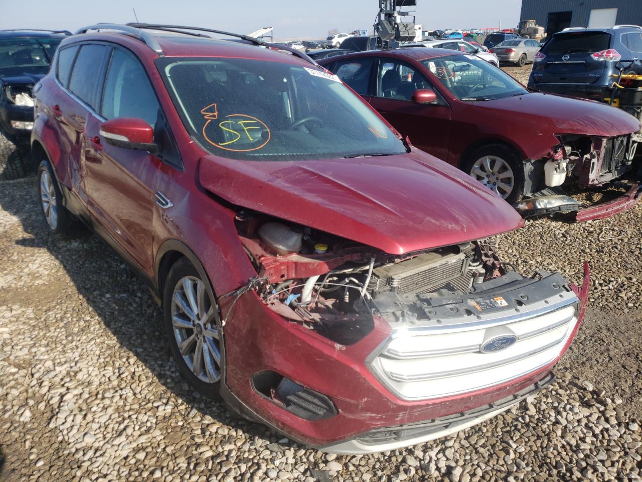 FORD ESCAPE TIT 2018 with VIN 1FMCU9J93JUC62331 - Photo from auction
