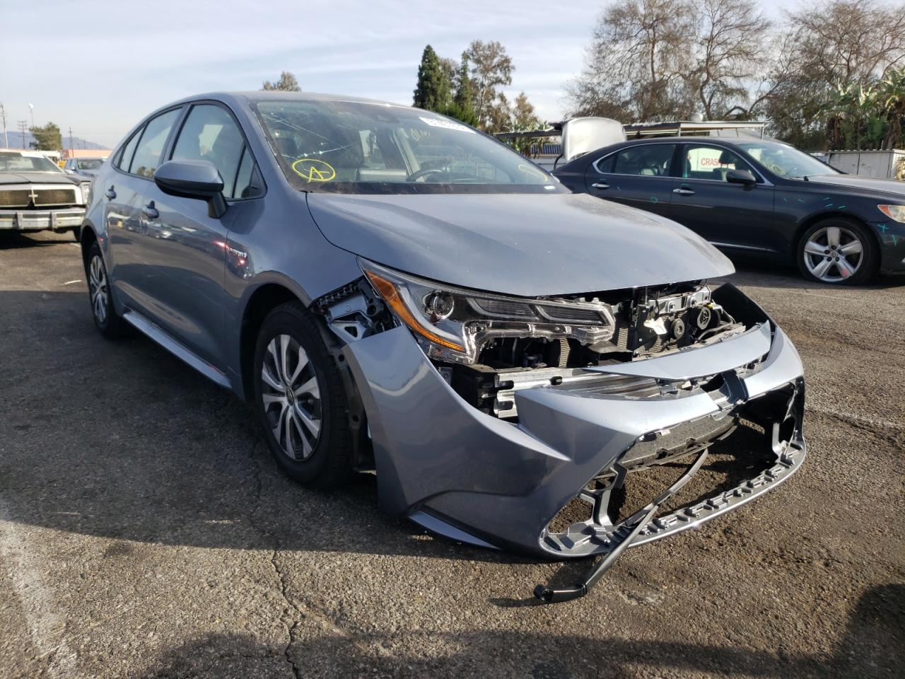 TOYOTA COROLLA LE 2021 with VIN JTDEAMDE3MJ027774 - Photo from auction