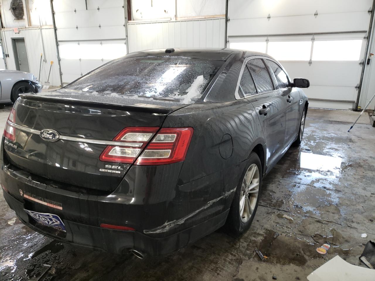 Photo 4 from auction – 2013 FORD TAURUS SEL with VIN 1FAHP2E81DG144247