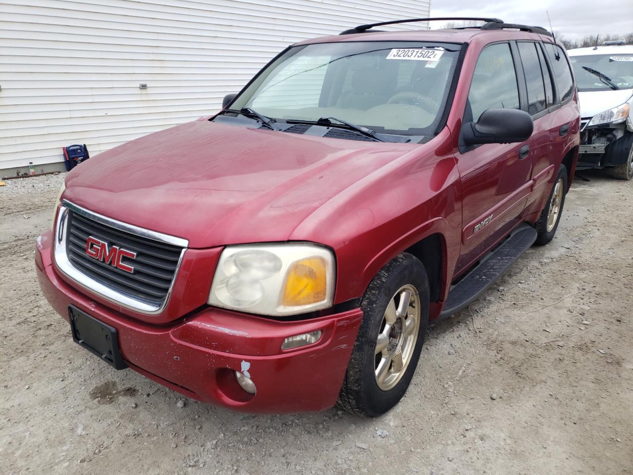 Photo 9 from auction – 2002 GMC ENVOY with VIN 1GKDT13S522215526