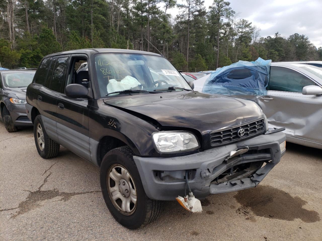 TOYOTA RAV4 1999 with VIN JT3GP10VXX0040175 - Photo from auction