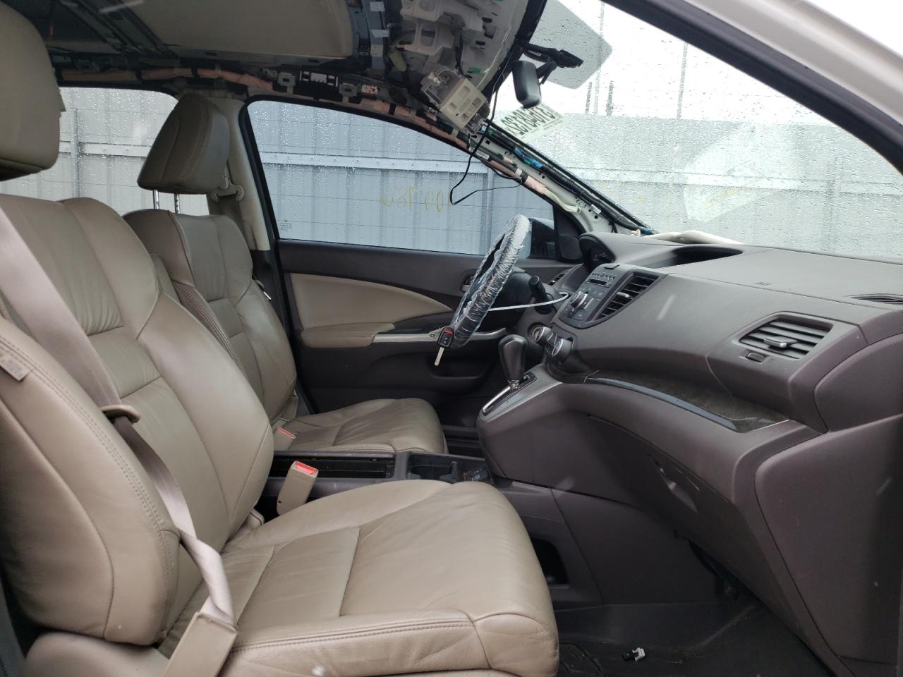 Photo 5 from auction – 2014 HONDA CR-V EXL with VIN 5J6RM4H79EL035477
