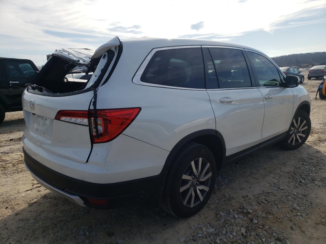 Photo 4 from auction – 2021 HONDA PILOT EXL with VIN 5FNYF5H50MB045512