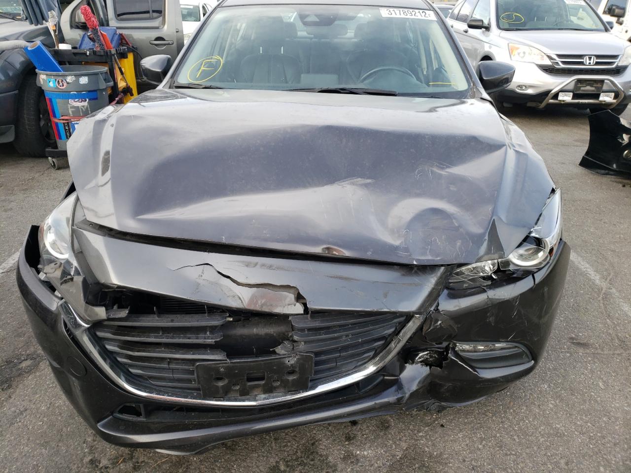 Photo 9 from auction – 2018 MAZDA 3 TOURING with VIN 3MZBN1V39JM187057