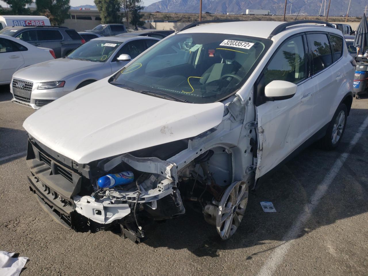 Photo 2 from auction – 2018 FORD ESCAPE SE with VIN 1FMCU0G99JUC63339