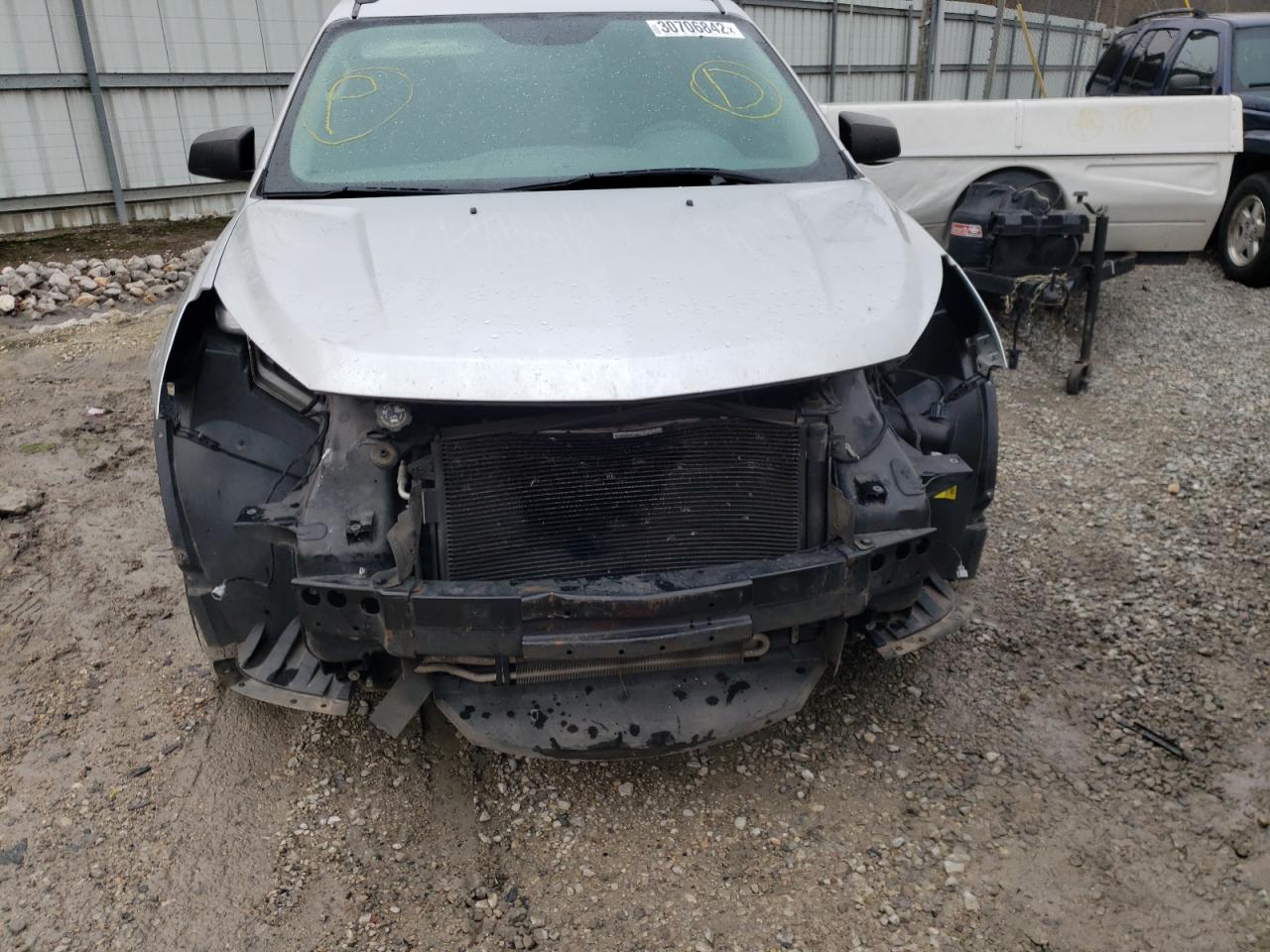 Photo 9 from auction – 2014 CHEVROLET TRAVERSE L with VIN 1GNKRFED6EJ232320