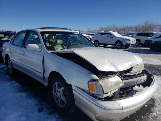 TOYOTA AVALON XL 1998 with VIN 4T1BF18B8WU275440 - Photo from auction