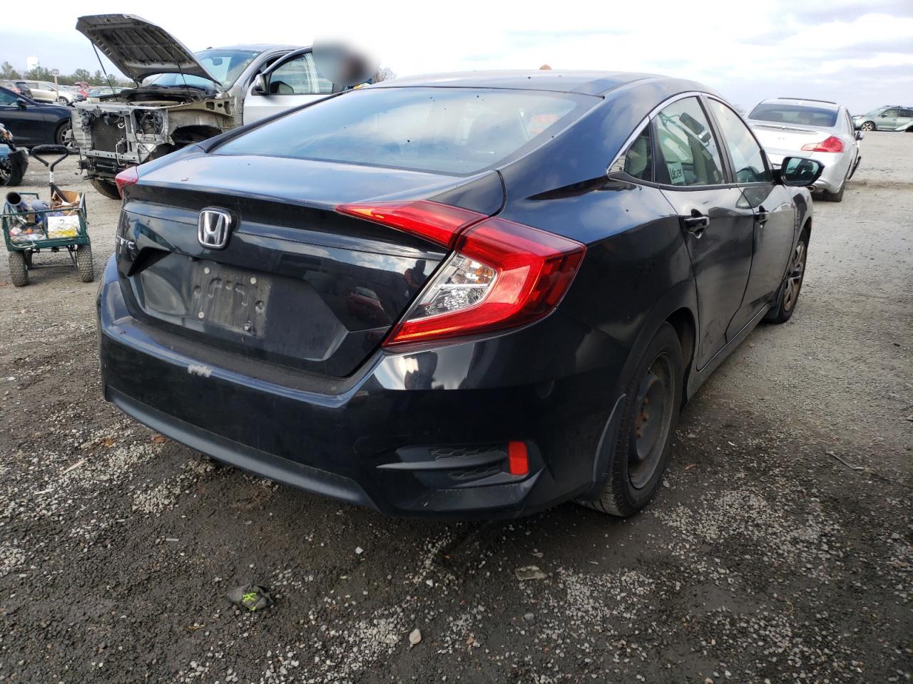 Photo 4 from auction – 2016 HONDA CIVIC LX with VIN 2HGFC2F51GH577370