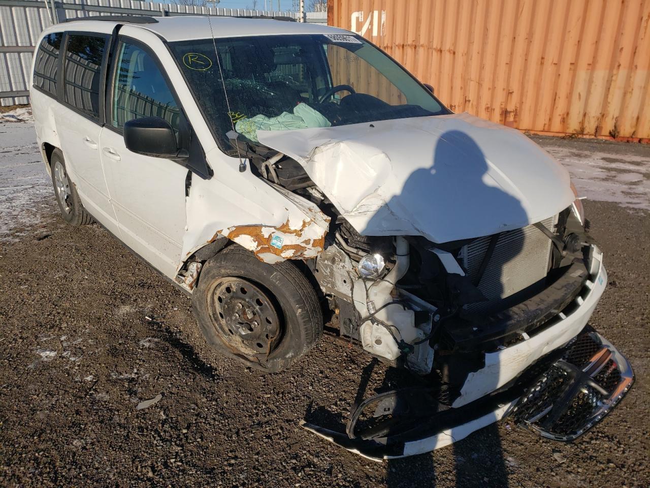 DODGE GRAND CARA 2015 with VIN 2C4RDGBG4FR701122 - Photo from auction