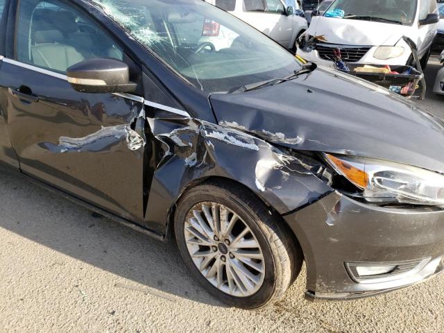 Photo 9 from auction – 2015 FORD FOCUS TITA with VIN 1FADP3J23FL299172