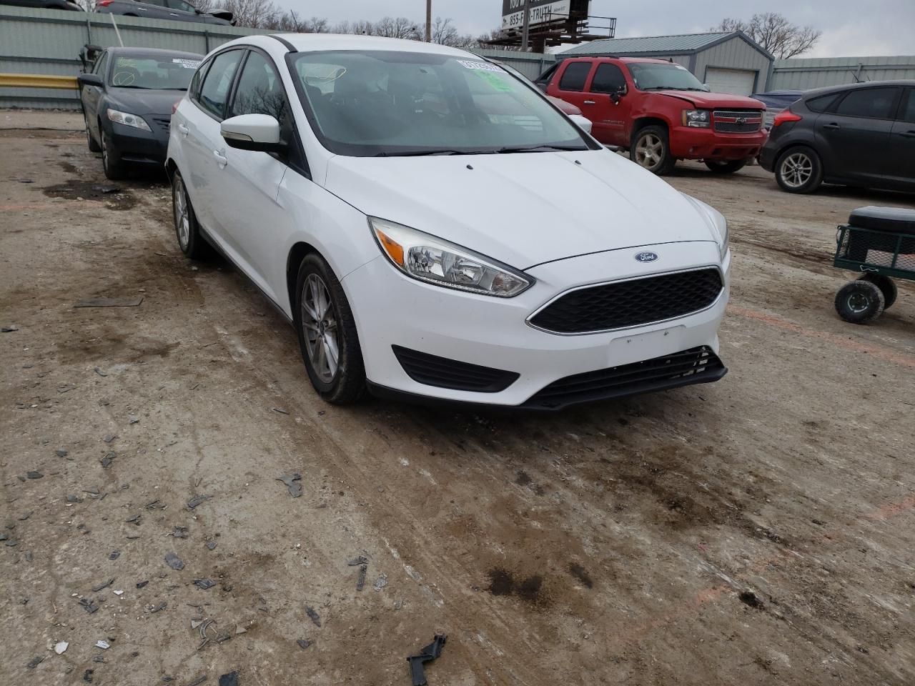 FORD FOCUS SE 2015 with VIN 1FADP3K24FL249931 - Photo from auction