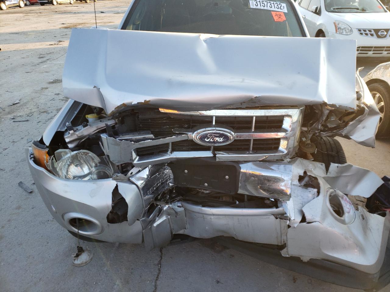 Photo 9 from auction – 2012 FORD ESCAPE LIM with VIN 1FMCU0EG5CKB90874