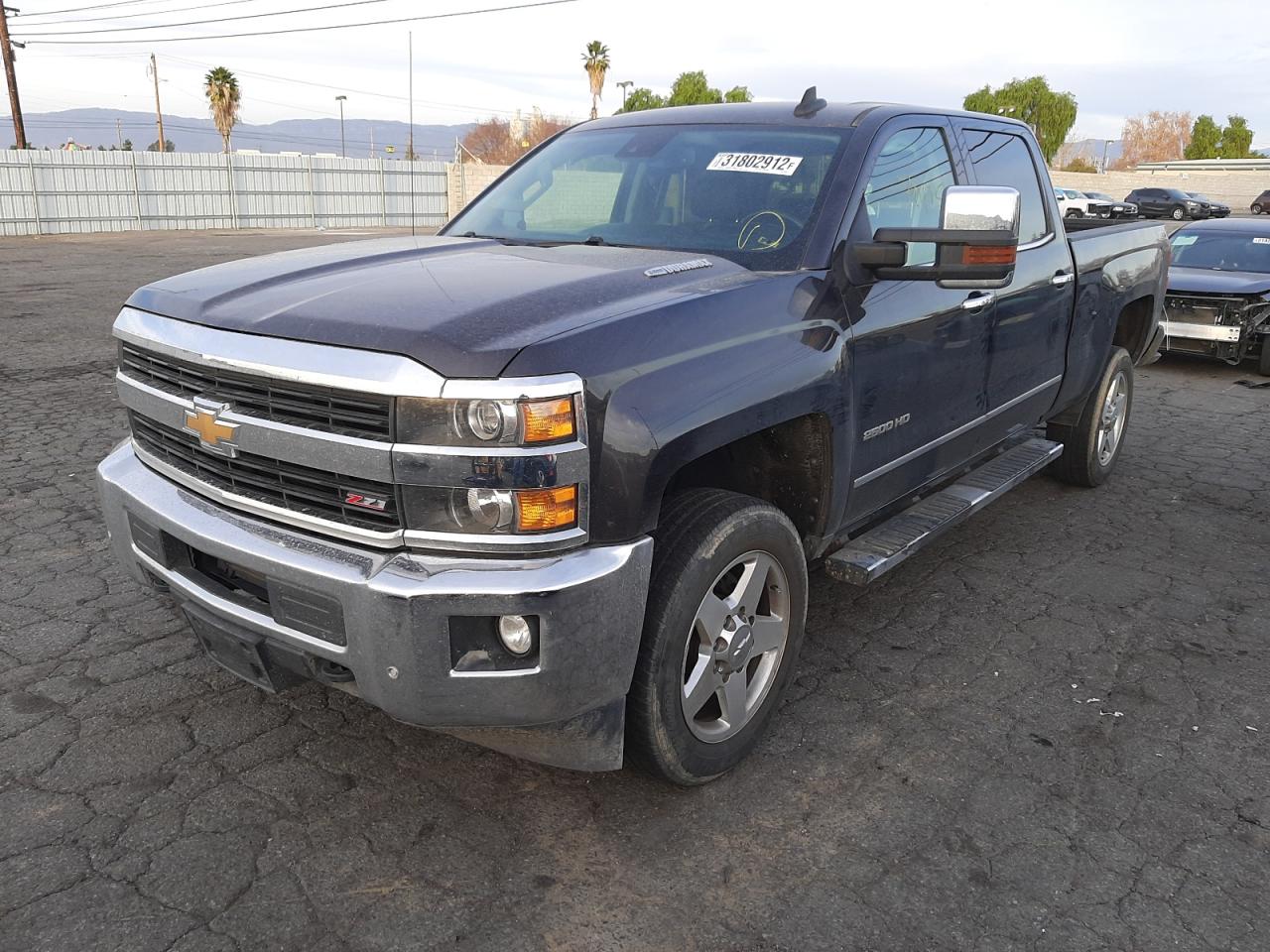 Photo 2 from auction – 2015 CHEVROLET SILVERADO with VIN 1GC1KWE8XFF629075
