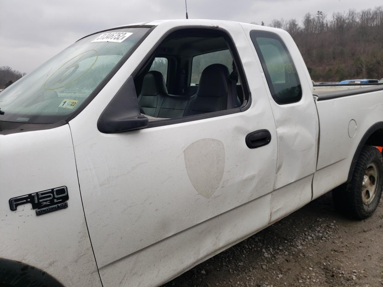 Photo 9 from auction – 2003 FORD F150 with VIN 1FTRX18W43NB39203