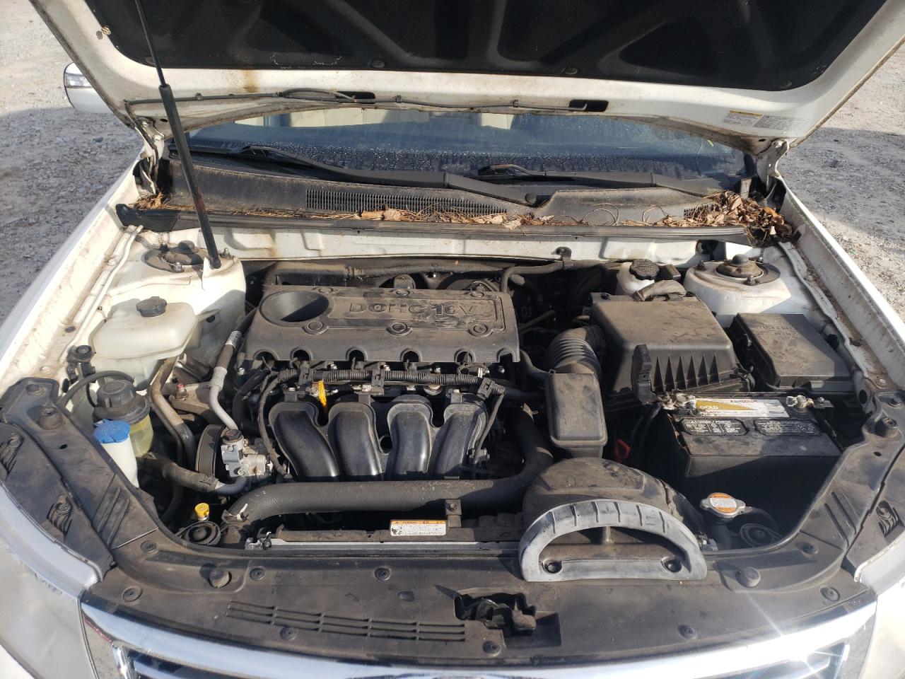 Photo 7 from auction – 2009 KIA OPTIMA LX with VIN KNAGE228095332676