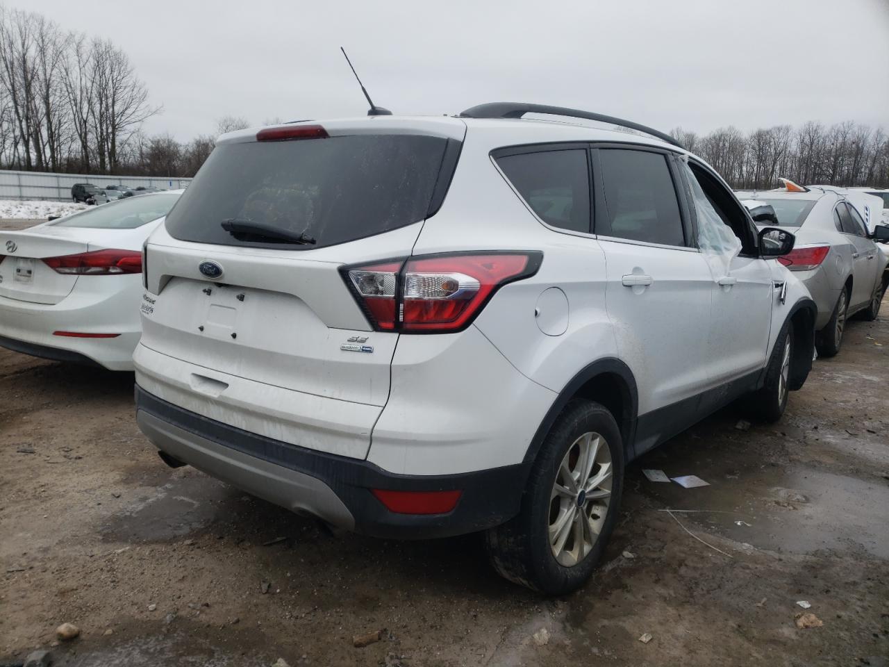 Photo 4 from auction – 2018 FORD ESCAPE SE with VIN 1FMCU9GD7JUC70394