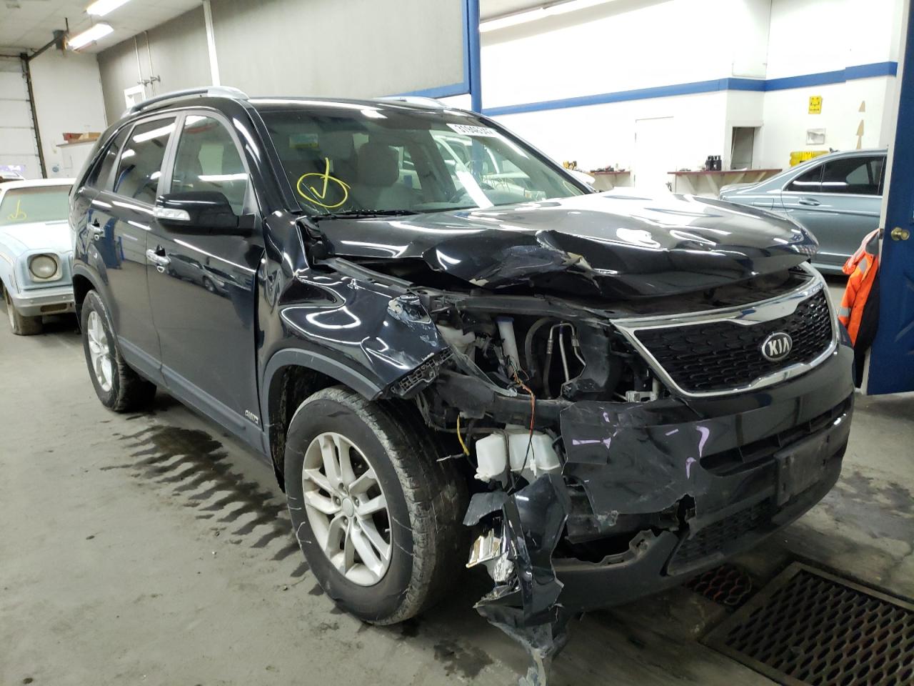 KIA SORENTO LX 2015 with VIN 5XYKTDA64FG649779 - Photo from auction