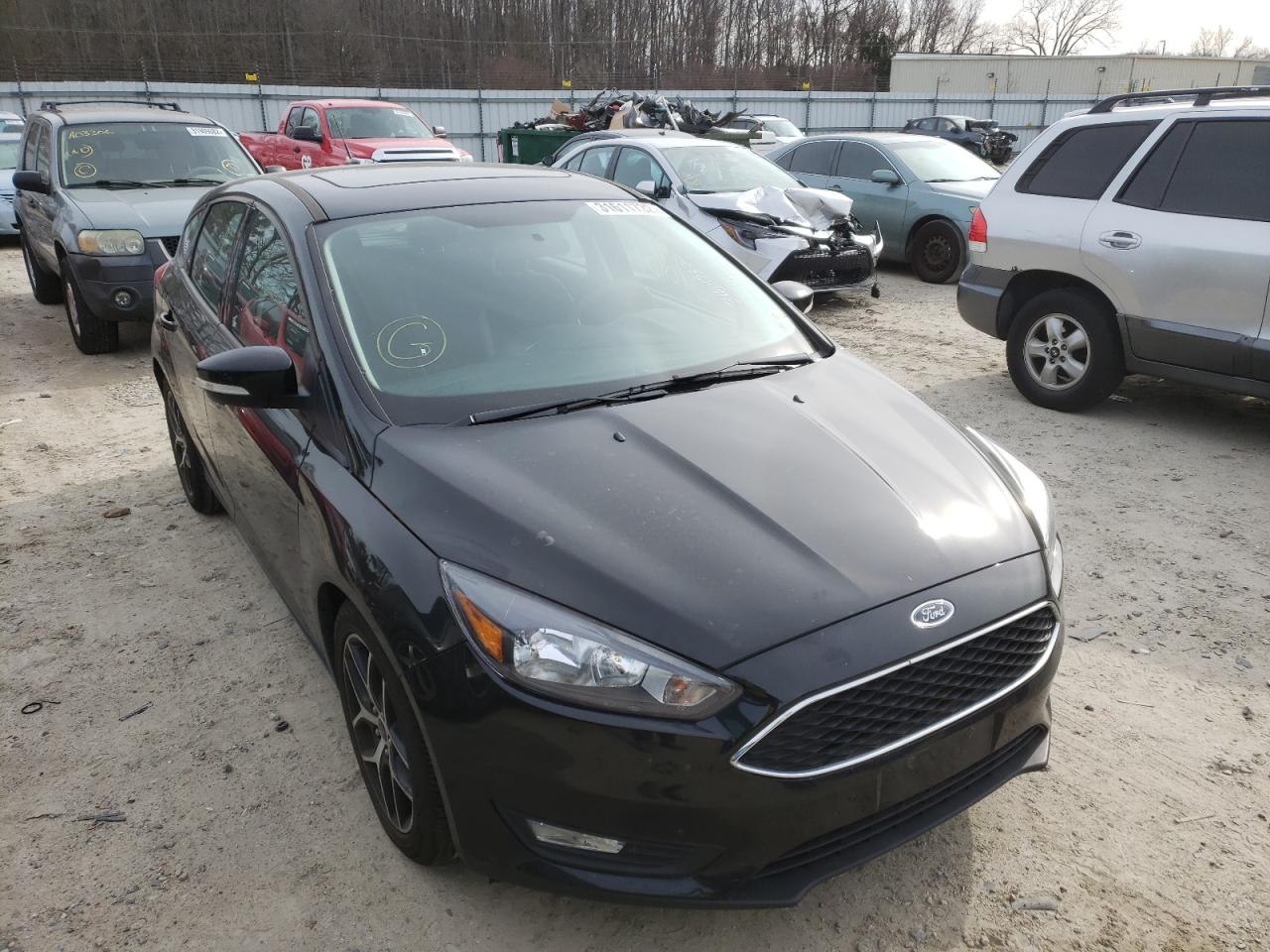 FORD FOCUS SEL 2018 with VIN 1FADP3M2XJL319907 - Photo from auction