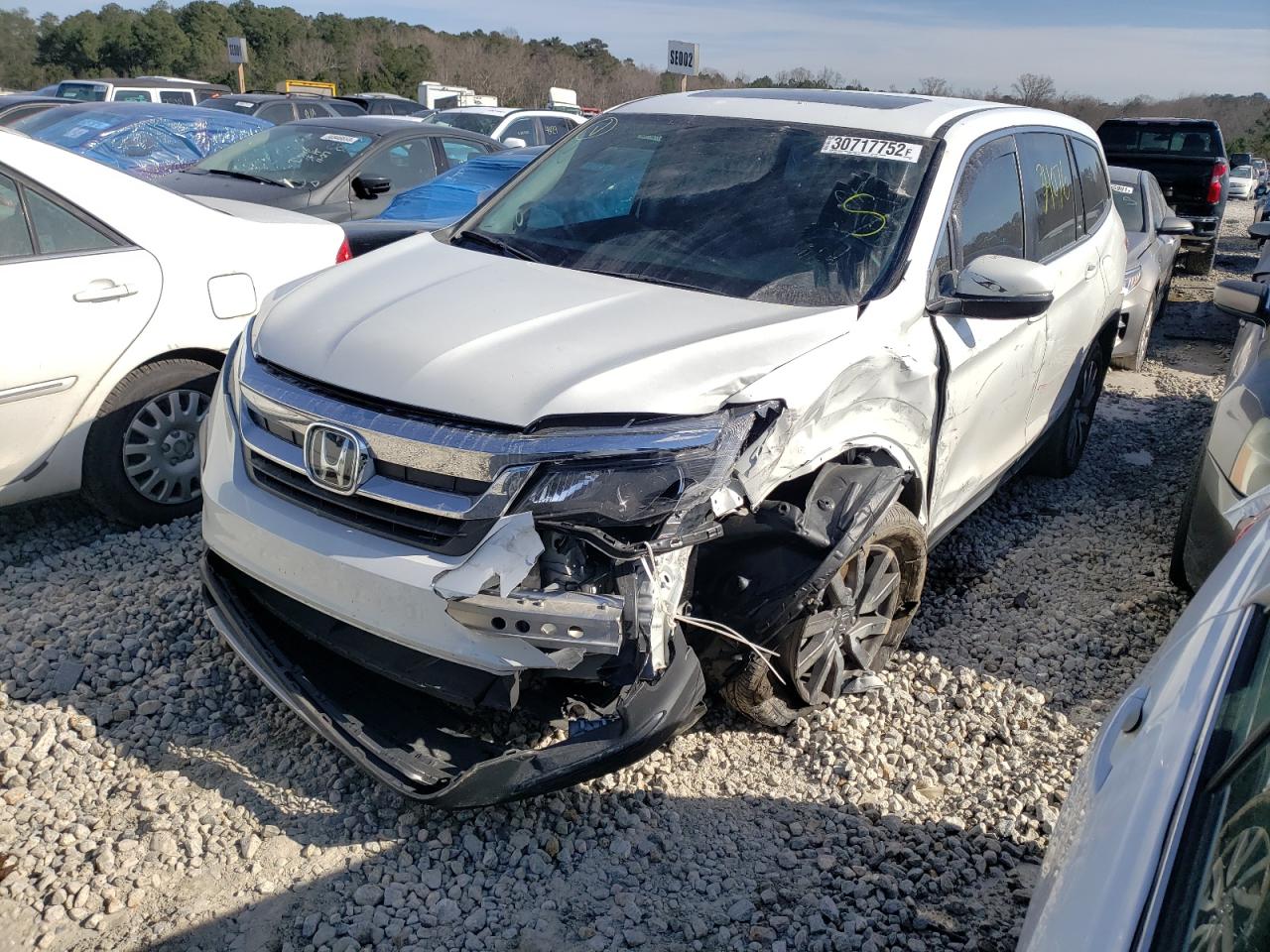Photo 2 from auction – 2021 HONDA PILOT EXL with VIN 5FNYF5H55MB021044