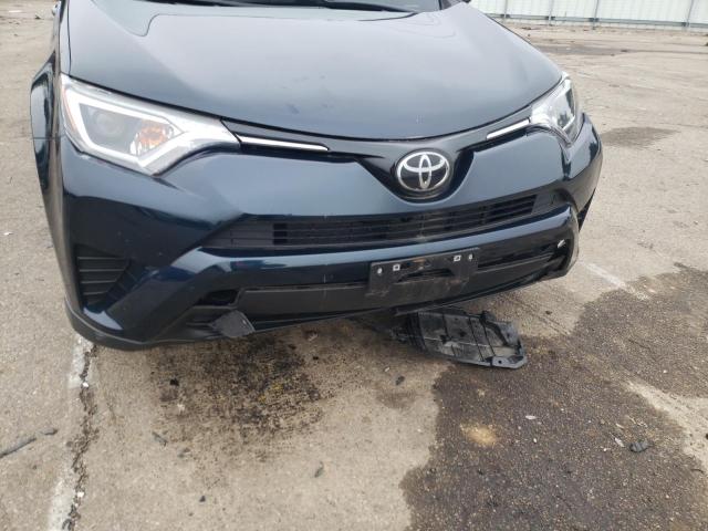 Photo 9 from auction – 2018 TOYOTA RAV4 LE with VIN JTMBFREVXJD255328