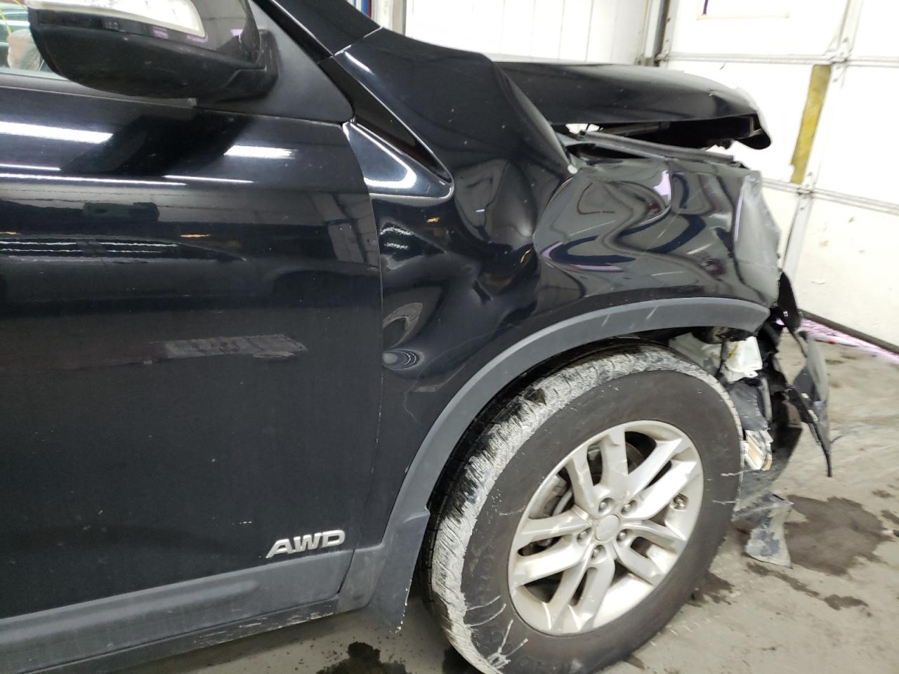 Photo 9 from auction – 2015 KIA SORENTO LX with VIN 5XYKTDA64FG649779
