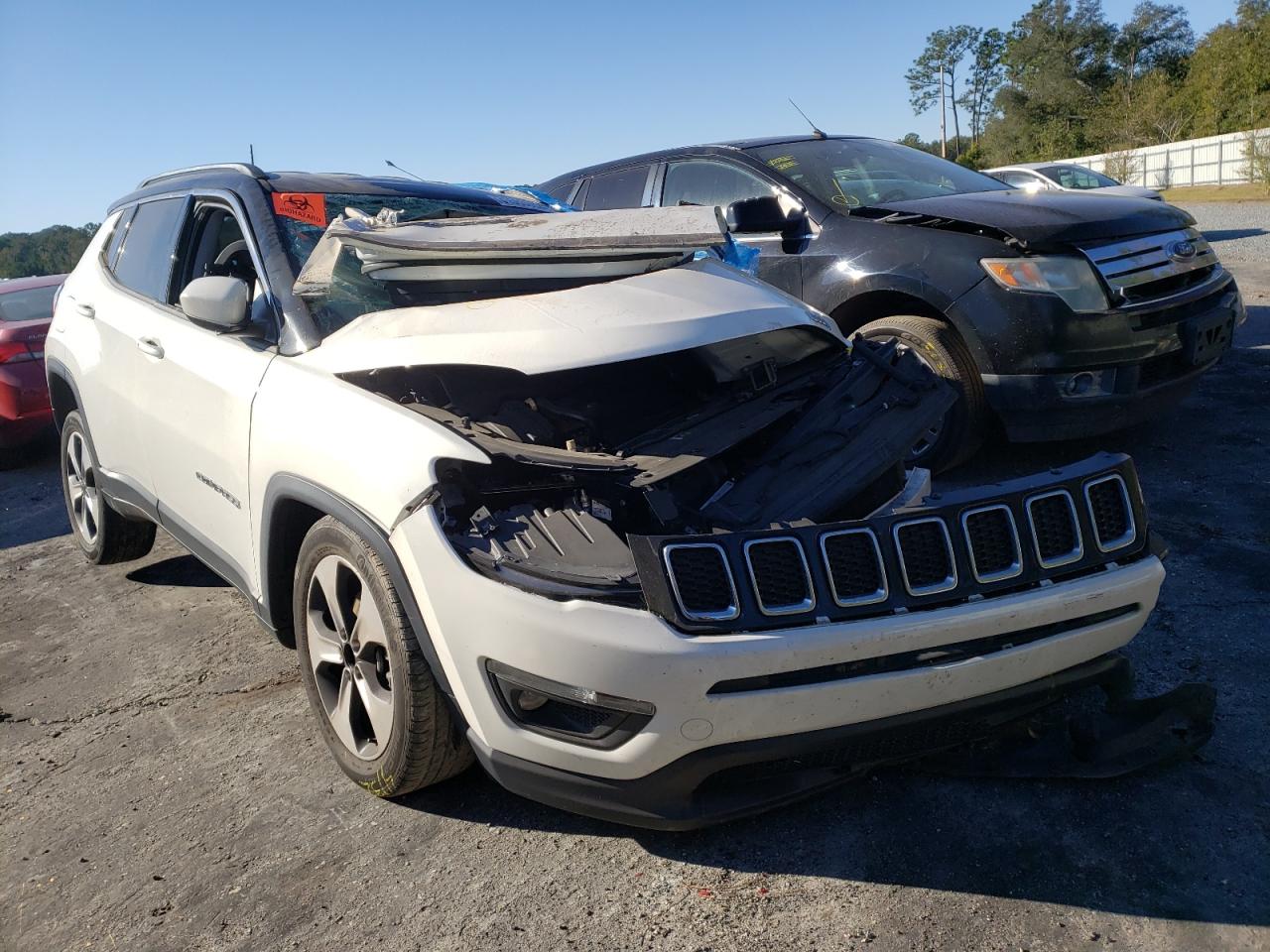 JEEP COMPASS LA 2018 with VIN 3C4NJCBB4JT233788 - Photo from auction