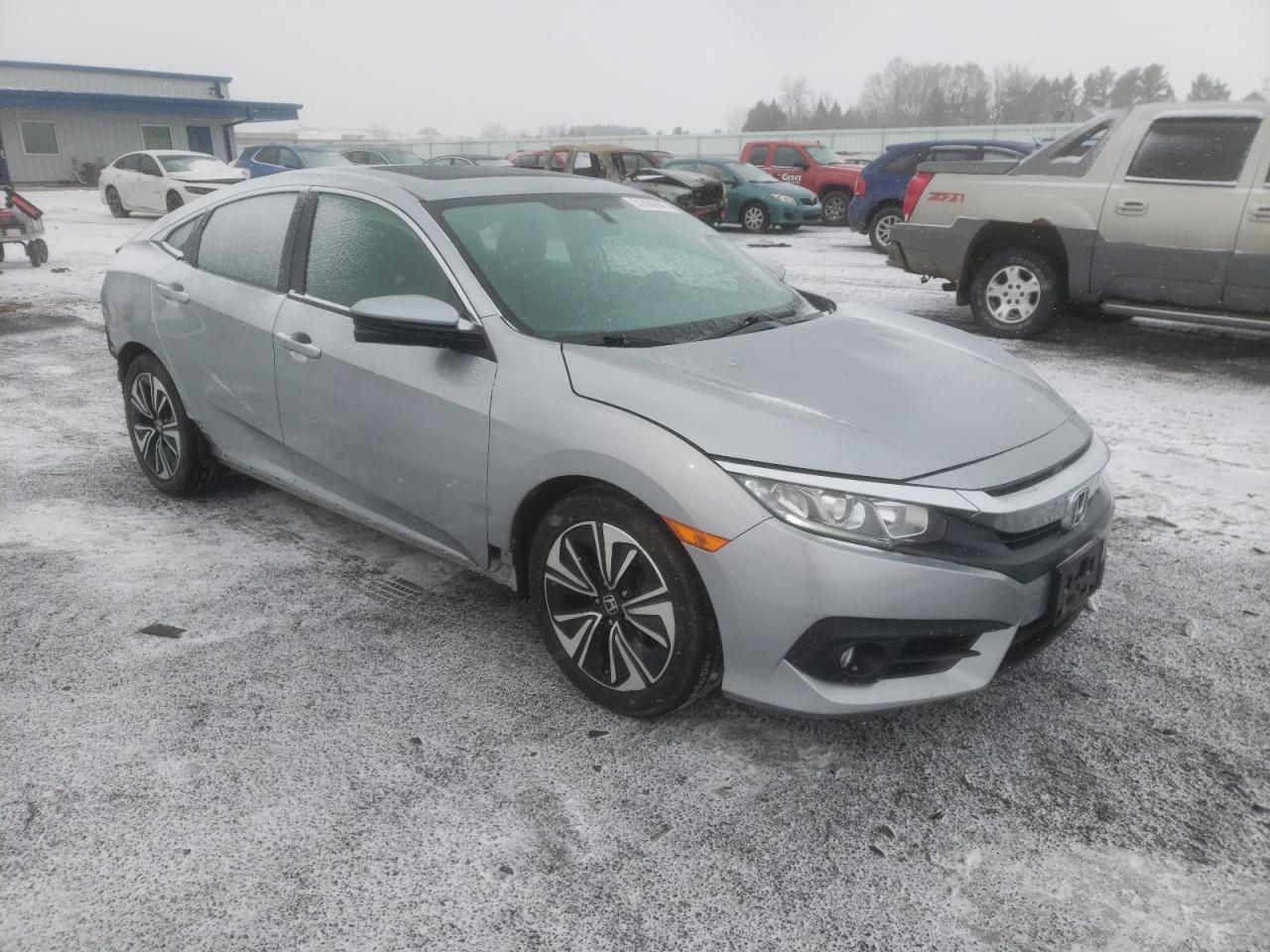 Photo 1 from auction – 2016 HONDA CIVIC EX with VIN 19XFC1F3XGE013042