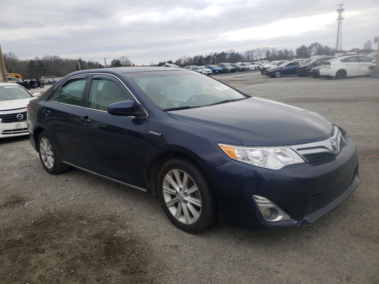 Photo 1 from auction – 2014 TOYOTA CAMRY HYBR with VIN 4T1BD1FK5EU117516