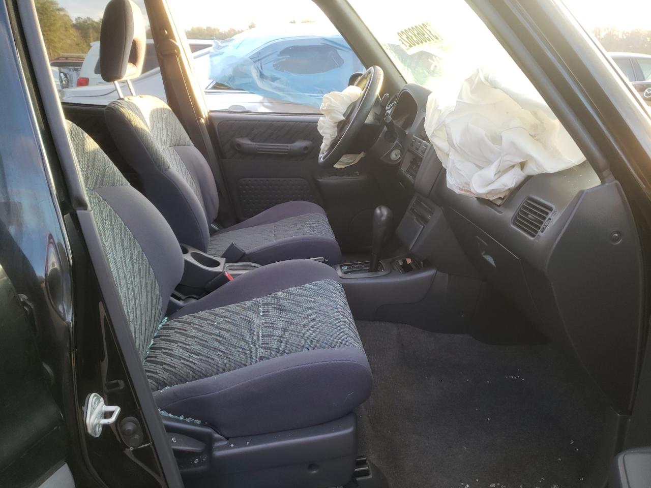 Photo 5 from auction – 1999 TOYOTA RAV4 with VIN JT3GP10VXX0040175