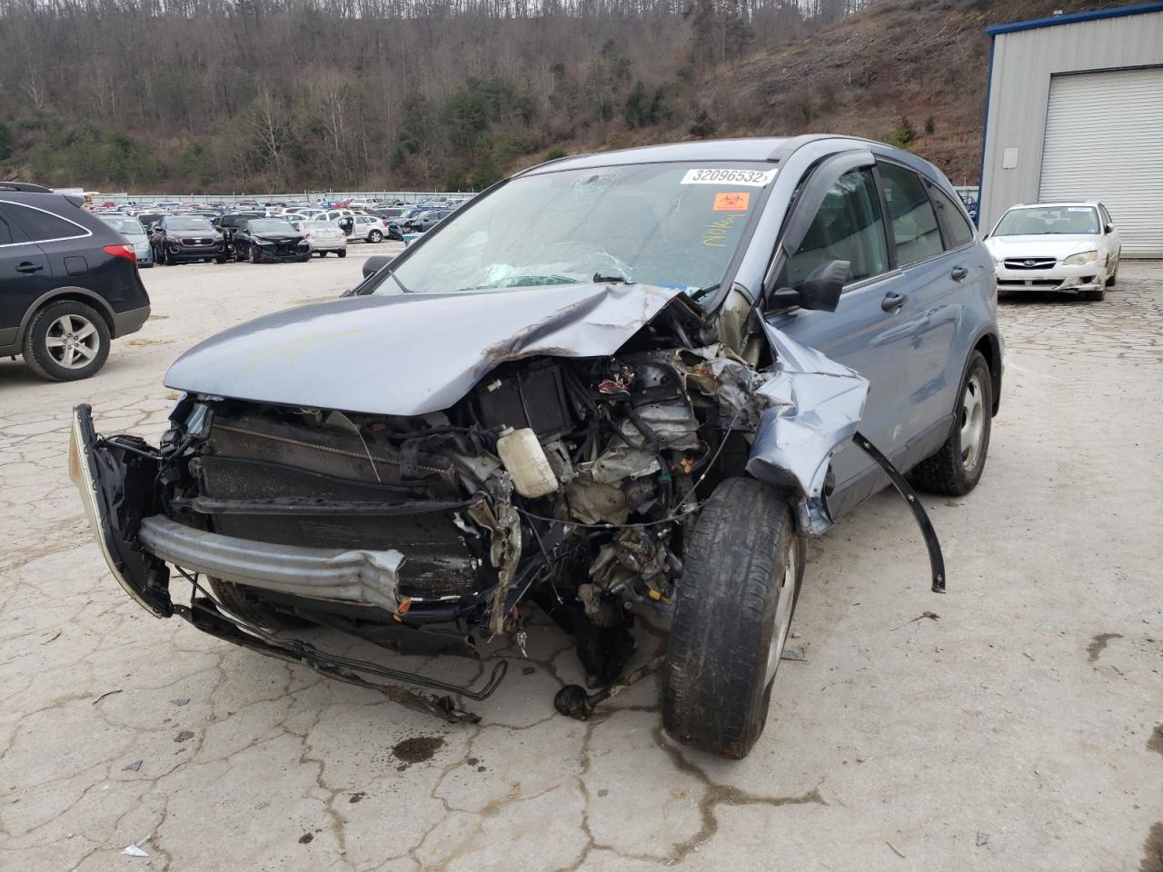 Photo 2 from auction – 2011 HONDA CR-V LX with VIN 5J6RE4H30BL035504